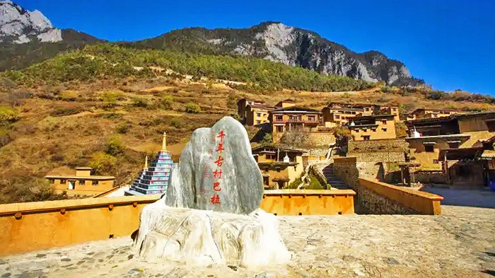 Tibetan houses nestled deep in the dramatic gorges of Bala Village